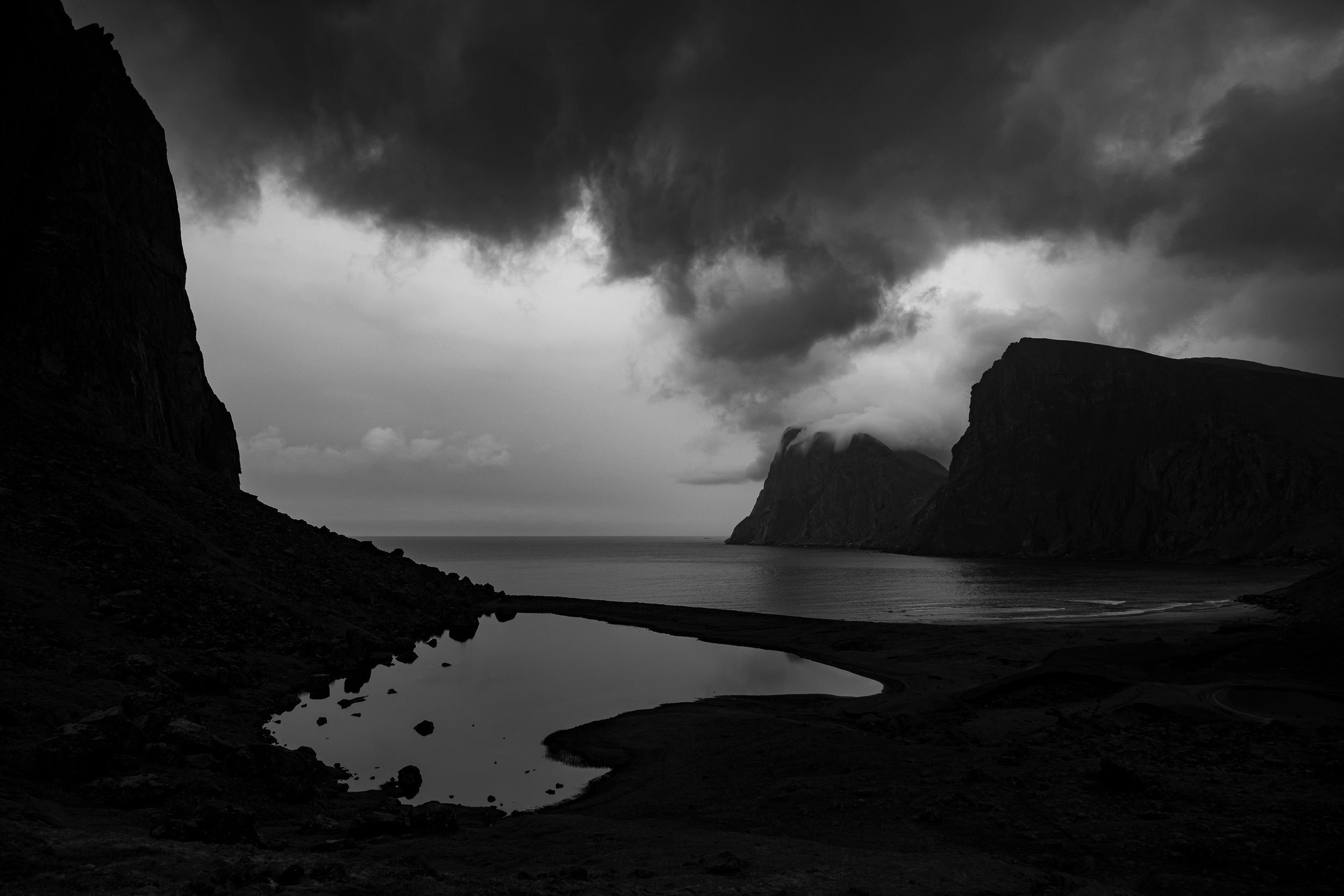 Mirrored Lake above Kvalvika Beach with Building Storm Clouds: Limited Edition Framed Print